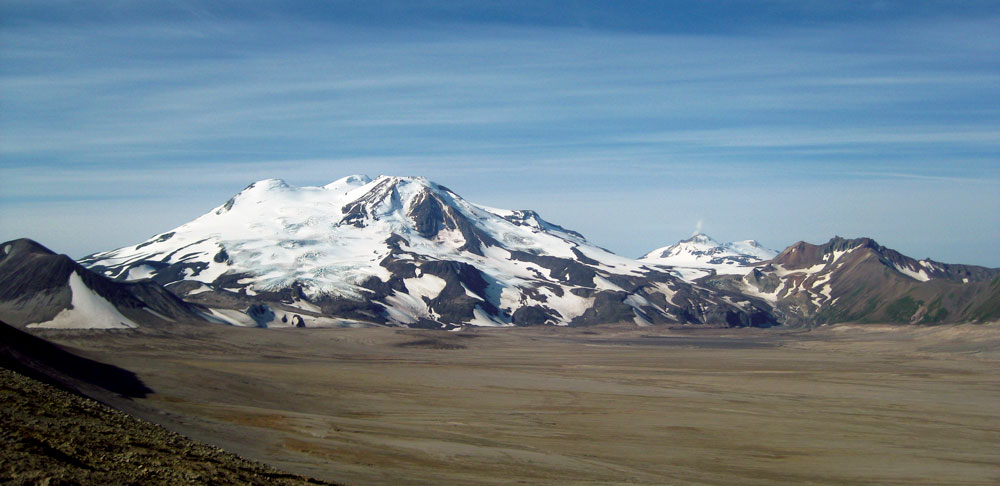 Figure 1. View of Mount Mageik (center) and Mount Martin (right, with plume) as seen from Baked Mountain on 11 July 2013. Photo credit T. Lopez