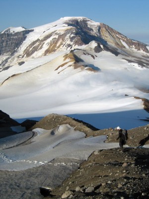 Another day on the field. Francesco Capecchiacci, (from National Reseach Council, Italy) hikes along Mount Martin’s crater rim. Mount Mageik can be seen in the background. The photo was taken in July 2013 by Taryn Lopez during a two-week field campaign conducted in the Katmai Volcanic Cluster in Alaska.