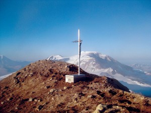 Figure 3. Mount Martin co-located seismic and MultiGas station with Mount Mageik in the background. Photo credit T. Lopez