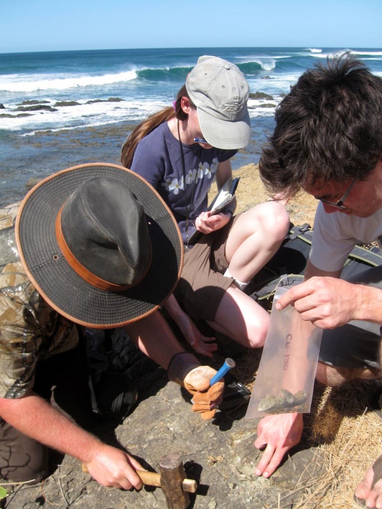 Figure 4. Shawn Morrish, Kelly Kinder, Andrew Barnhart (Cal Poly Pomona) sample basalt from marine terrace tread for 36Cl exposure age dating, Playa Negra.